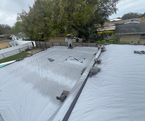 Residential roof tarped